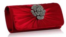 Röd clutch med blomdekor